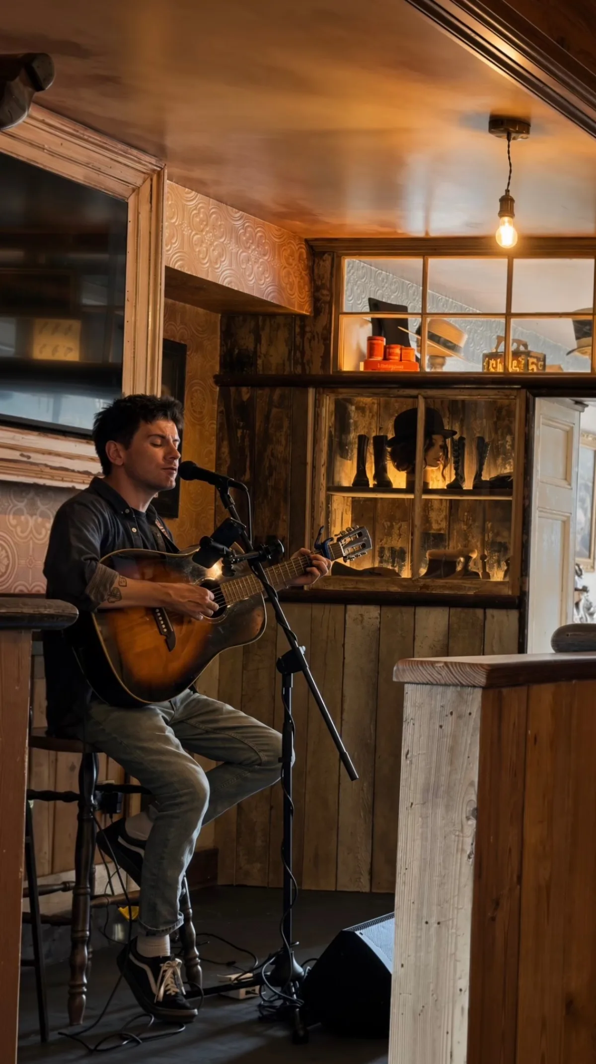 Sam Baggott playing the first Sunday session in the window at Leicester House